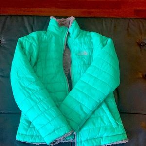 Mint green reversible north face girls jacket. Looks brand new. Gently worn